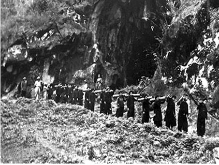 Ethnic minority civilian laborers transport supplies to the front