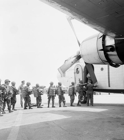Paratroopers board a C-119 Packet aircraft at Cát Bi airport to head to Điện Biên