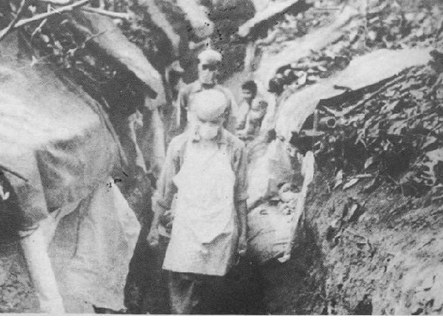 Transporting wounded soldiers in the main communication trench