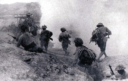 Vietnamese soldiers advancing through trenches under fire