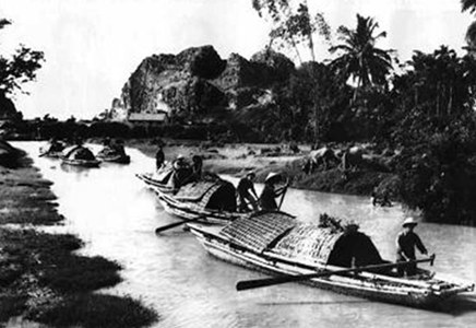 A fleet of boats from Zone VI transporting military provisions